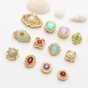 Assorted copper gold plated hollow spacer beads with colorful gemstones for DIY jewelry.