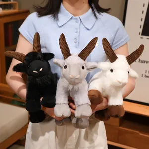 Set of three realistic mountain goat plush toys in black, grey and white colors for home decor