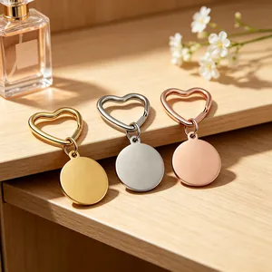 Three-piece set of heart-shaped stainless steel keychains in gold, silver and rose gold