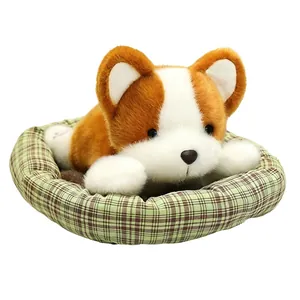 Adorable soft Corgi puppy plush toy lying in a green checkered round pet bed basket