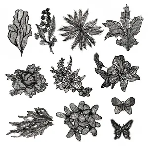 Detailed view of black monofilament embroidery lace patches with floral butterfly motifs
