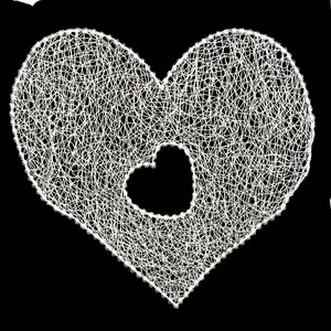 Delicate white fishline embroidery heart lace patch with a hollow center for DIY projects