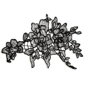 Detailed view of black fishline embroidery lace flower patch with hollow-out design