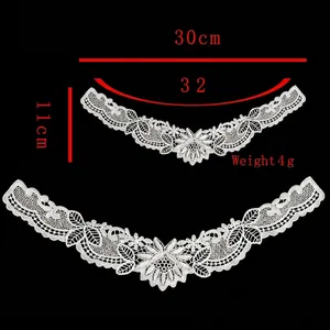 Detailed view of white hollow lace embroidery collar with precise 30cm width measurement