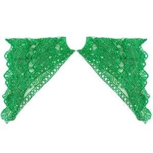 Detail of intricate green embroidered milk silk lace patches for clothing accessories.