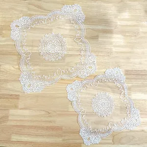 Elegant white square lace decorative mat with intricate floral embroidery details