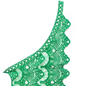 Detailed macro shot of vibrant green milk silk embroidered lace floral collar trim accessory