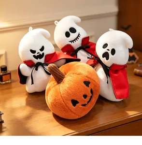 Detailed view of soft Halloween ghost plushies with capes and smiling pumpkin toy