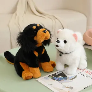 Realistic Tibetan Mastiff and white Pomeranian puppy plush toy set on green table