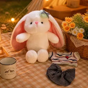Cute white long-eared bunny plush toy with removable striped heart shirt and bow