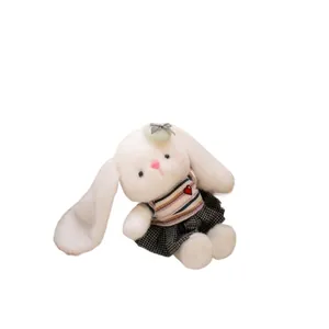 Cute plush bunny toy featuring long ears and wearing a striped shirt with a heart detail
