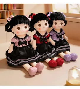 Set of three cute school style plush girl dolls in pink, red, and purple dresses.
