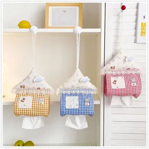 Three cute house-shaped hanging tissue holders in colorful gingham patterns for home decor