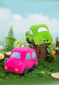 Detailed close-up view of pink and green cartoon plush car toys in a creative nature scene