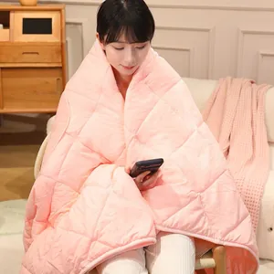 Soft pink quilted 2-in-1 nap blanket for office travel and home comfort