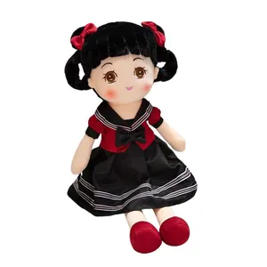 Cute school style plush girl doll featuring red bows and a classic sailor outfit design