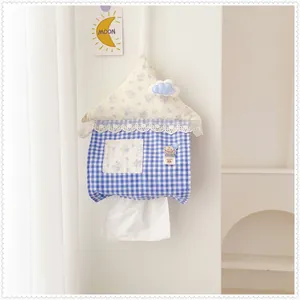 Cute house-shaped hanging tissue holder with blue gingham and floral roof details.