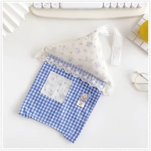 Creative house-shaped blue gingham tissue bag with delicate lace trim and floral roof detail