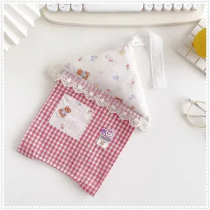 Cute house-shaped hanging tissue bag with red gingham and delicate lace trim detail