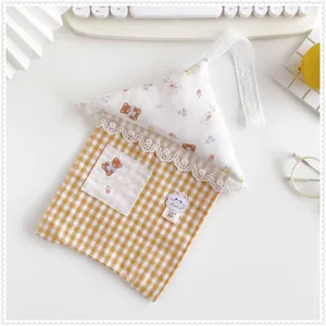 Cute house-shaped hanging tissue bag featuring yellow gingham pattern and white lace trim