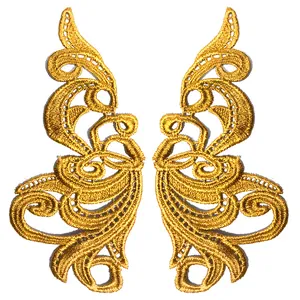 Detailed close-up of golden water-soluble symmetrical lace embroidery patches