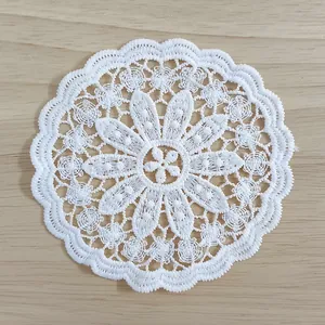 Exquisite detailed macro view of white floral water-soluble lace embroidery coaster
