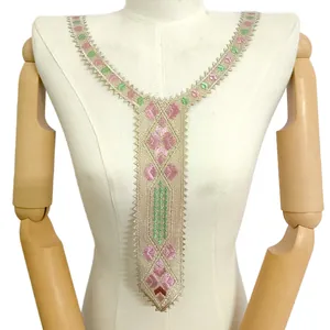 Macro view of heavy embroidery lace fake collar with colorful floral patterns on mannequin.