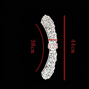 Macro detail showing dimensions of white water-soluble lace embroidered doll collar