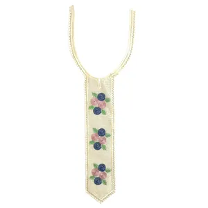 Intricate floral embroidered lace collar accessory in a unique tie shape design.