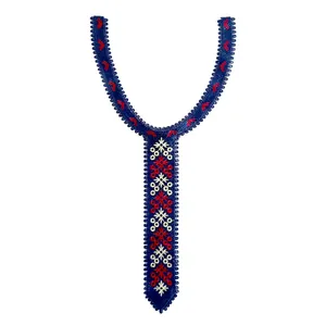 Close-up of blue embroidery lace collar with red and white floral tie shape design