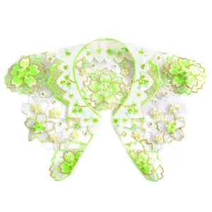 Detailed view of green floral embroidery on a white organza Hanfu cloud shoulder collar