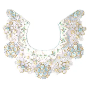Detail view of embroidered organza Hanfu collar with blue cherry blossom flowers