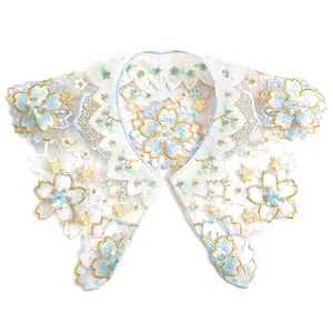 Close-up detail of floral embroidered organza detachable collar with intricate lace