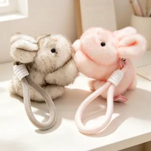 Schattige pluche konijnensleutelhangers in roze en grijs, geurend konijnenspeelgoed