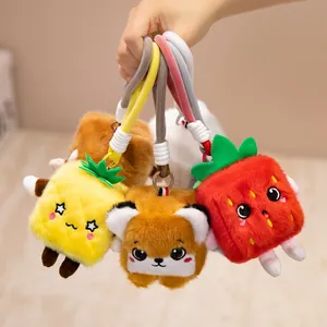 Cute plush fruit cube keychains including pineapple and strawberry doll charms for bags