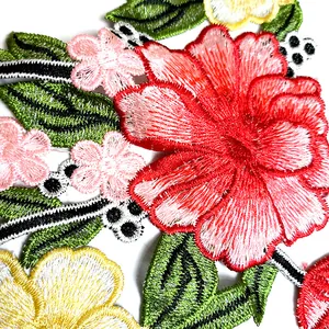 Detailed view of high-density floral embroidery stitches on a collar patch.