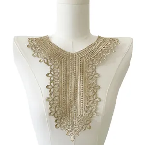 Detailed view of gold thread embroidered lace collar with intricate hollow floral pattern