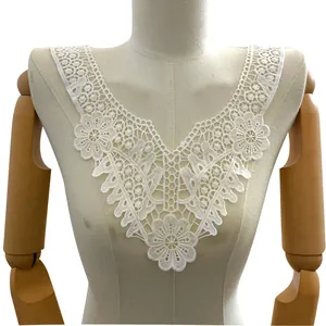 Close-up of white milk silk embroidered lace fake collar with hollow floral design