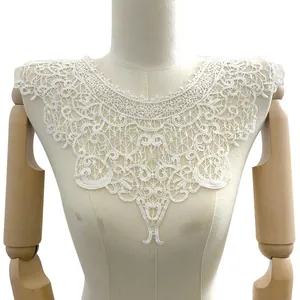 Detailed view of intricate white milk silk embroidered lace fake collar applique
