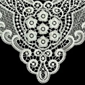 Close-up of white milk silk embroidered lace collar with hollow flower patterns
