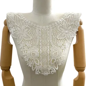 Detailed close-up of white milk silk floral embroidered lace collar on a mannequin