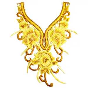 Vue détaillée de l'applique de col en dentelle à broderie florale jaune complexe.