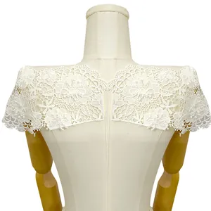 Close-up detail of white 3D floral embroidery lace applique for clothing necklines