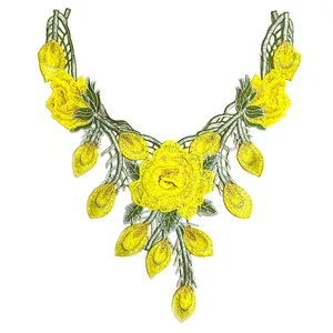 Detailansicht der gelben bestickten floralen Spitzenkragen mit feinen Stickereien und Mustern