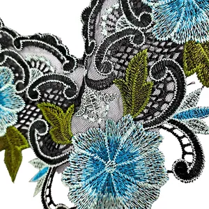 Detailed macro view of colorful heavy floral embroidery lace patch for DIY garment accessories