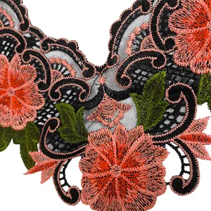 Close-up of colorful floral embroidery on black mesh lace for DIY accessories