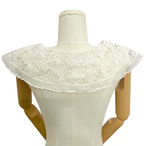 Detailed view of white floral milk silk embroidery on a delicate mesh lace collar accessory