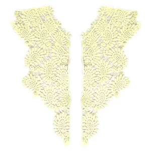 Detailed view of yellow milk silk lace collar appliqué with intricate floral embroidery