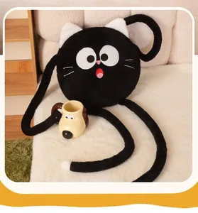 Close-up detail of a funny long-legged black cat plush pillow on a cozy white sofa