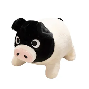 Adorable black-faced pig plush toy with a soft white body and realistic pink nose